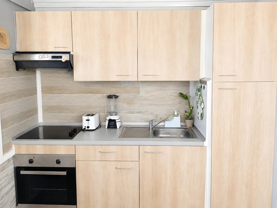 furniture, oven, storage, stove, toaster, kitchen