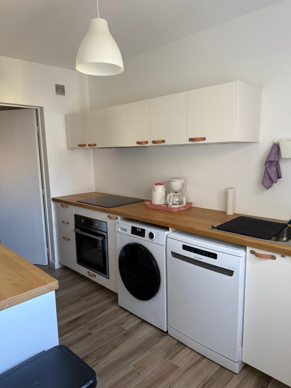 Kitchen or kitchenette, dishwasher, oven, stove