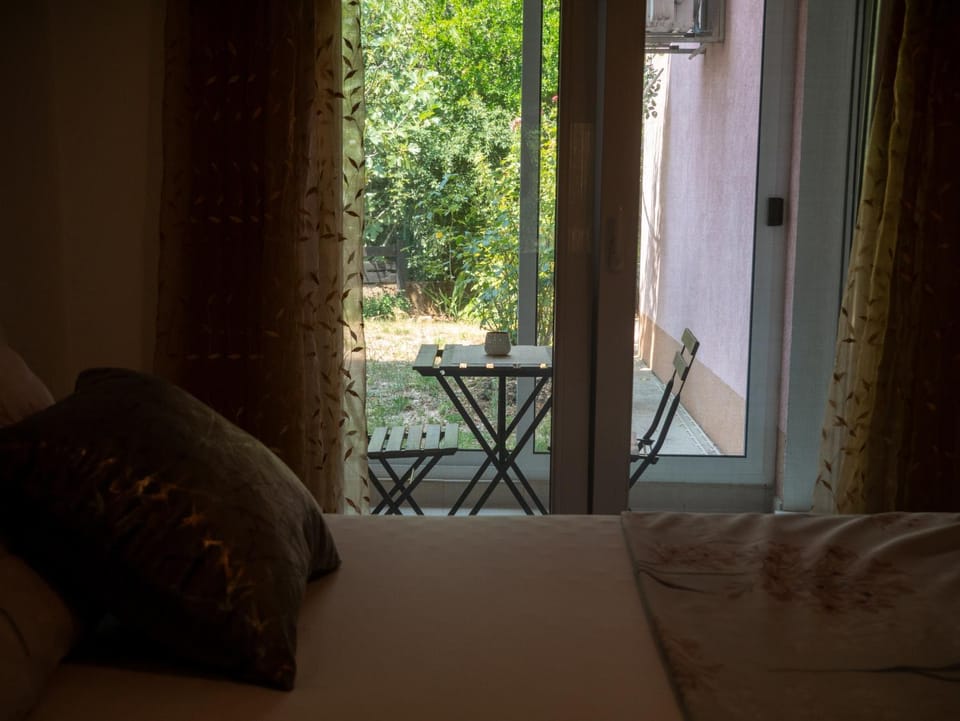 Patio, Bed, Seating area, Bedroom, Garden view