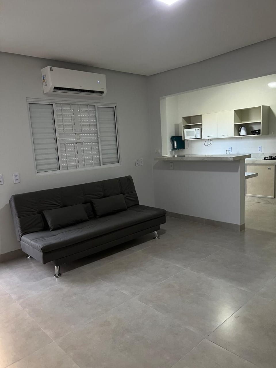 Kitchen or kitchenette, Living room, Seating area, Dining area, minibar, air conditioner