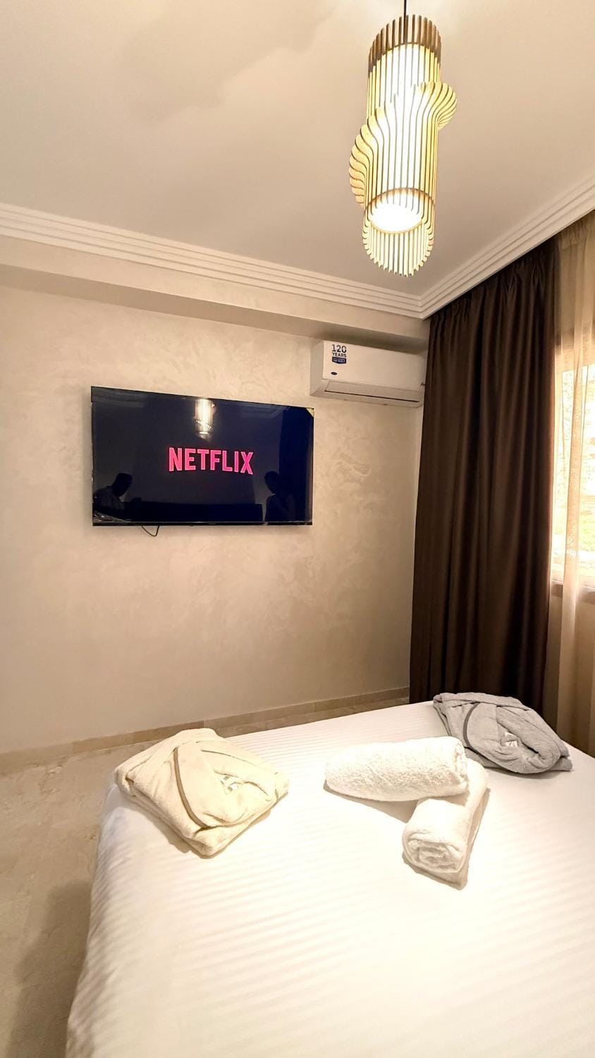 Duplex de Prestige Chic & Intemporel - Vue Piscine Apartment in Marrakesh