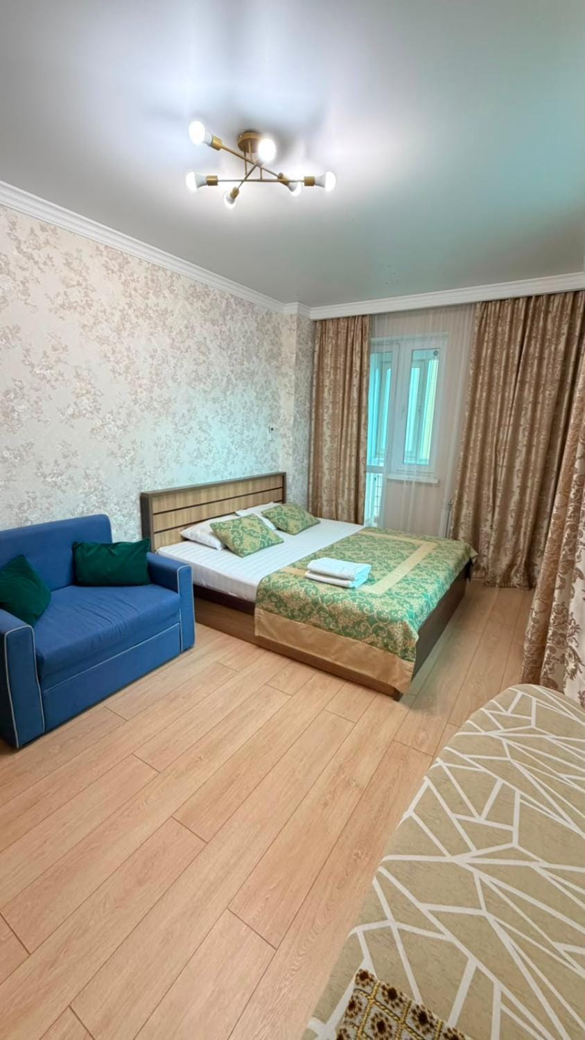 ЖК Времена года Весна новая 3х комнатная-студия Apartment in Kazakhstan