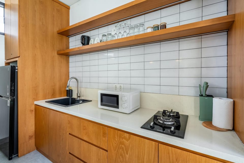 Kitchen or kitchenette, stove, toaster