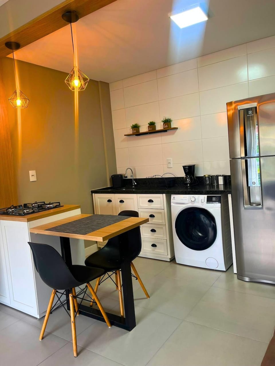 Kitchen or kitchenette, washing machine
