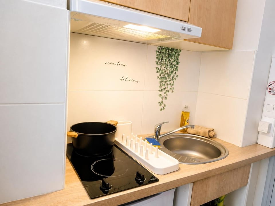 Kitchen or kitchenette, stove