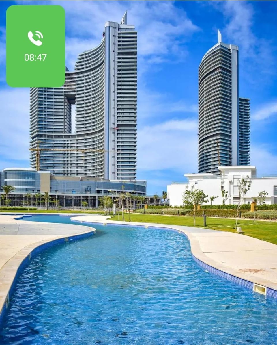 BG Premium Sea View & Pool Entrance- Alamein Towers Apartment in Egypt