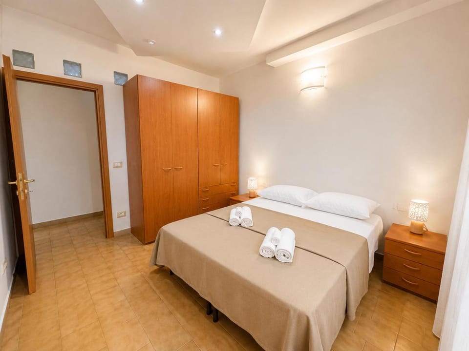 Bed, Photo of the whole room, Bedroom, towels, wardrobe