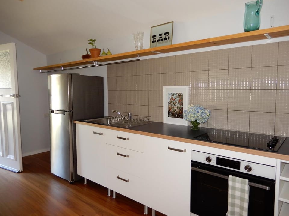 Kitchen or kitchenette, oven, stove