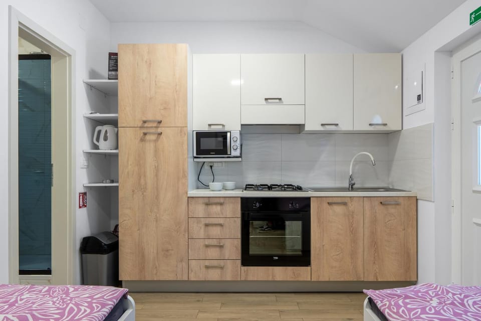 Kitchen or kitchenette, oven, stove, toaster
