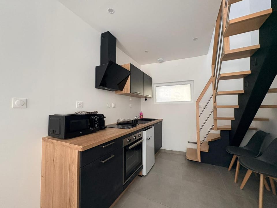 Kitchen or kitchenette, stove
