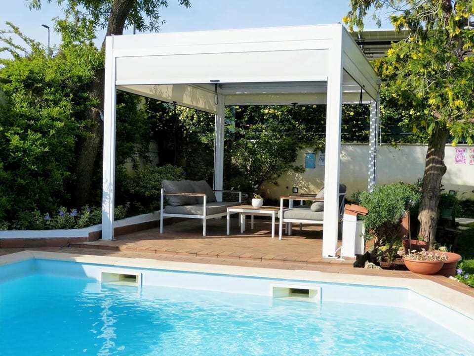 Garden, Balcony/Terrace, Seating area, Garden view, Swimming pool