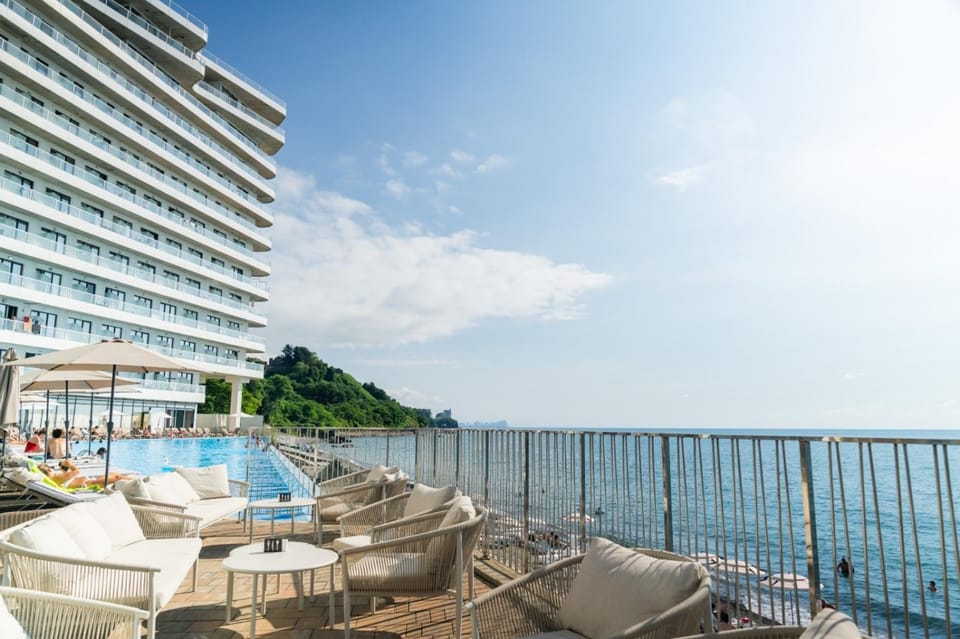 Property building, Natural landscape, View (from property/room), Seating area, Beach, Sea view