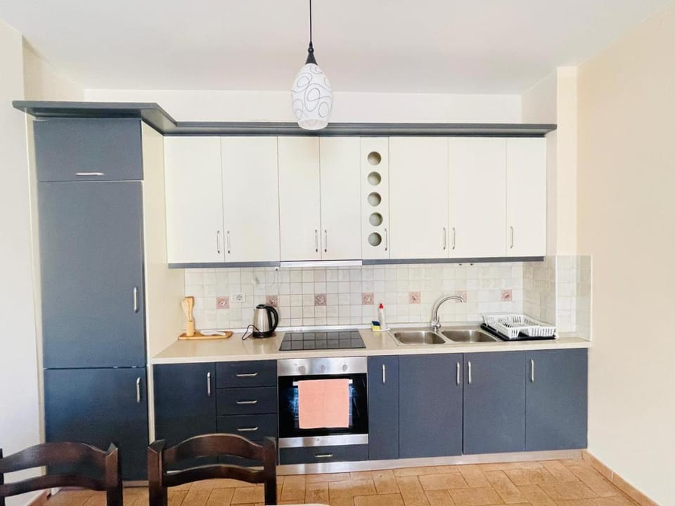 Kitchen or kitchenette, oven, stove