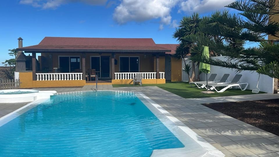 Property building, Living room, Swimming pool