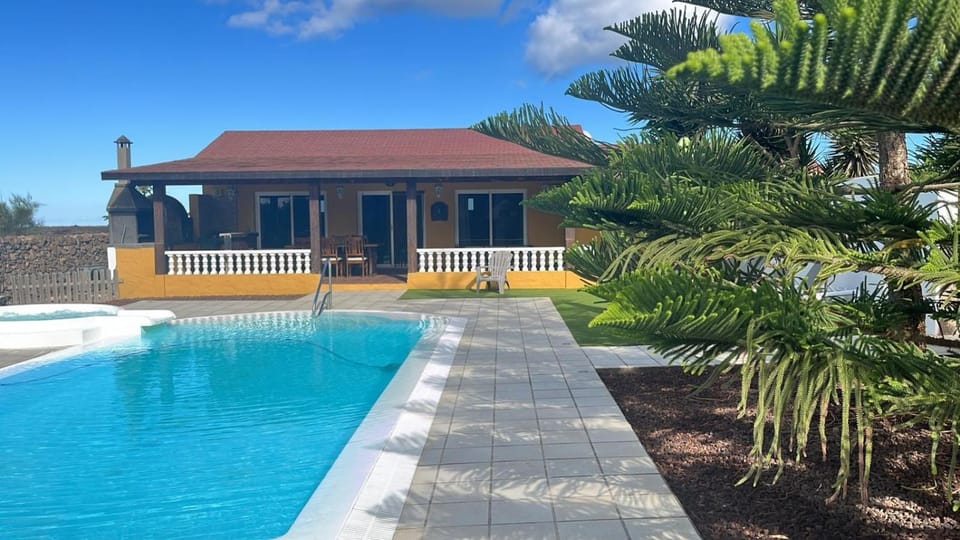 Property building, Living room, Swimming pool