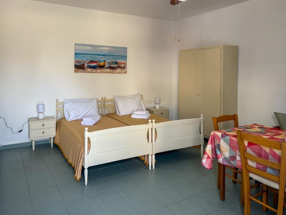 Photo of the whole room, Bedroom, towels, air conditioner