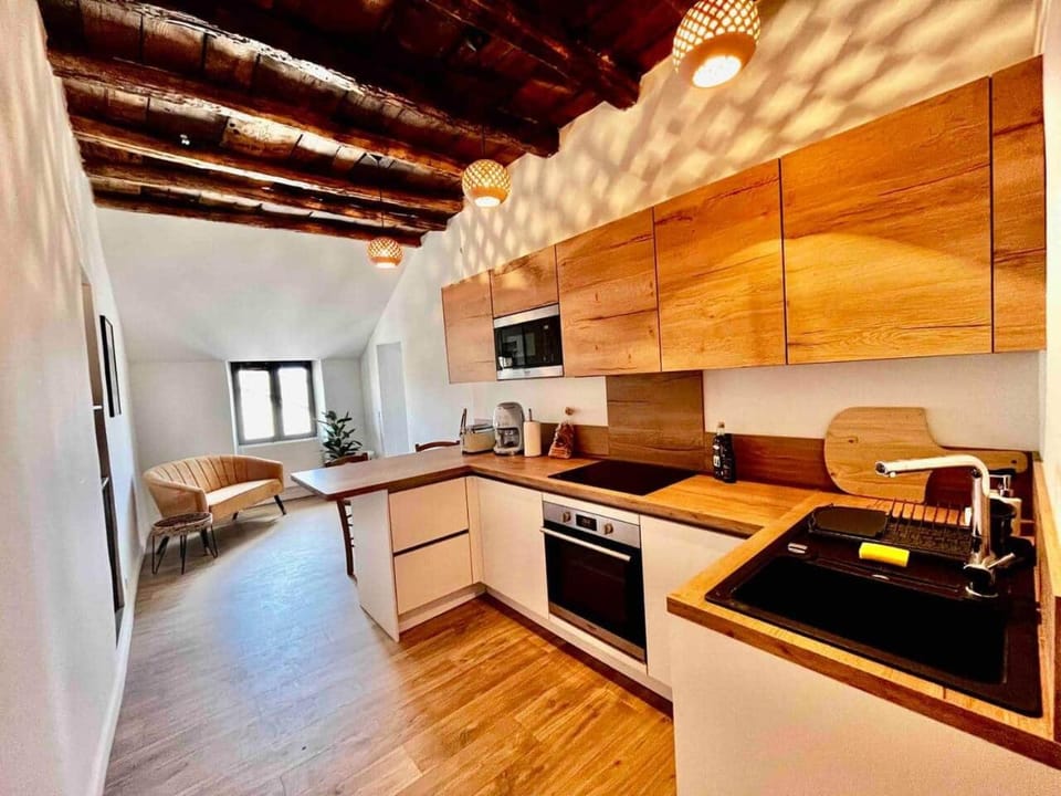 Kitchen or kitchenette, oven, stove, toaster