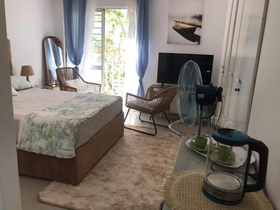 Bedroom in the Heart of Plateau, City Center Apartment in Praia