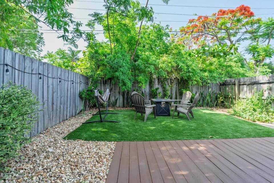 Fenced Turf Yard Bikes Hammock BBQ 65 Inch TV House in Boynton Beach