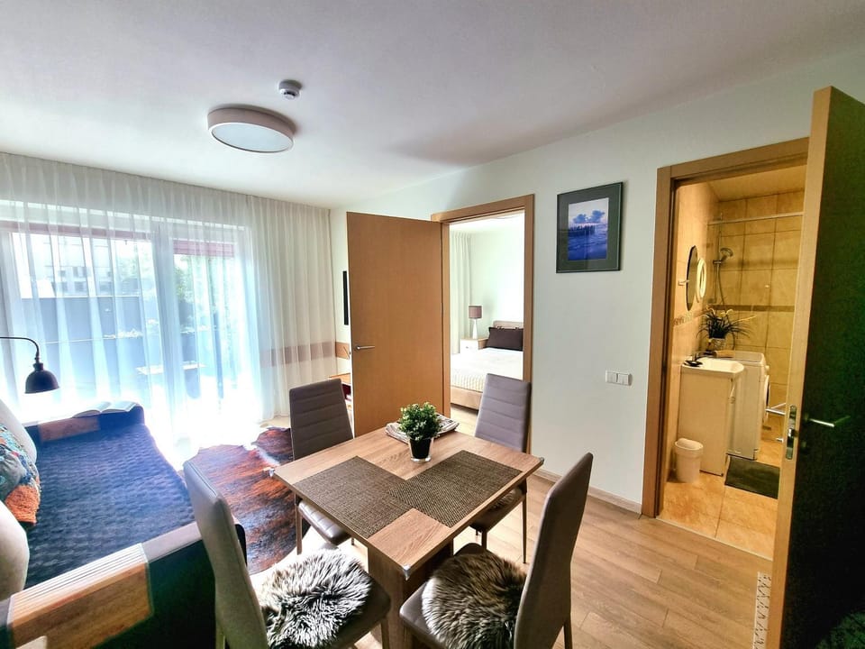 Jaukūs apartamentai su parkingu Malūnų vilose Apartment in Palanga
