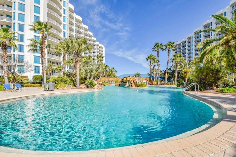 Coastal condo shared pools Onsite eateries Spa Wifi House in Destin