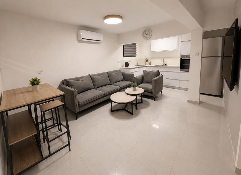 Kitchen or kitchenette, Living room, Seating area, Dining area, oven, stove, air conditioner