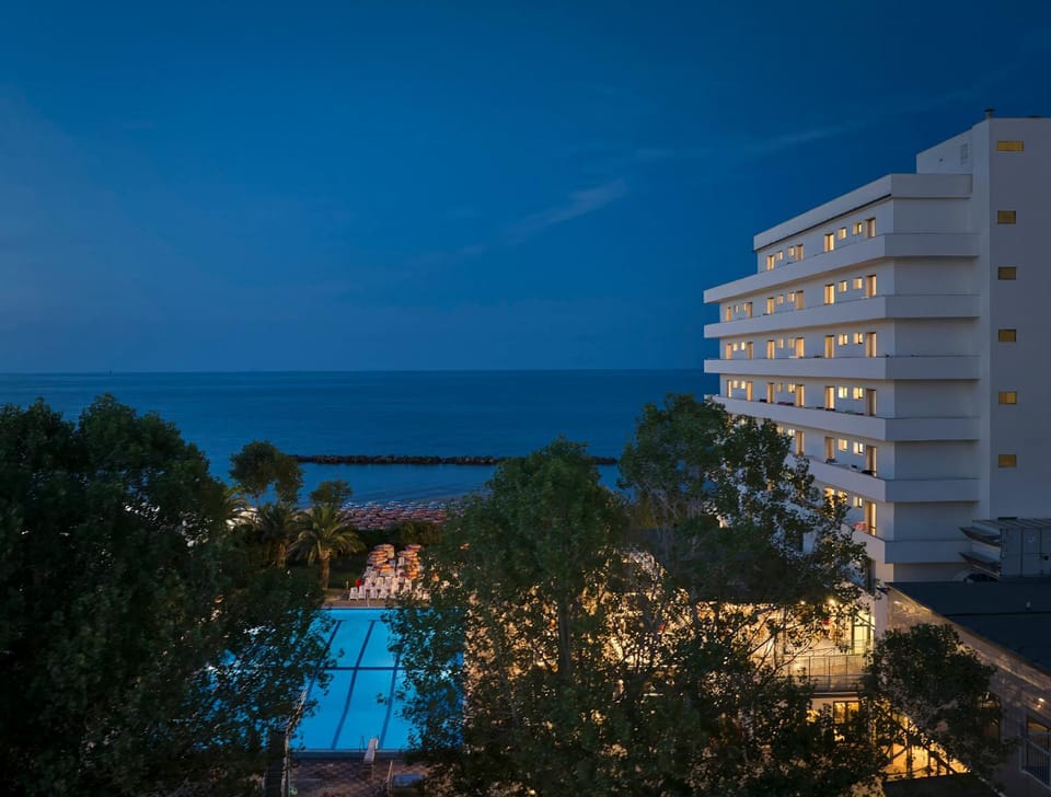 Property building, Night, Natural landscape, Pool view, Swimming pool