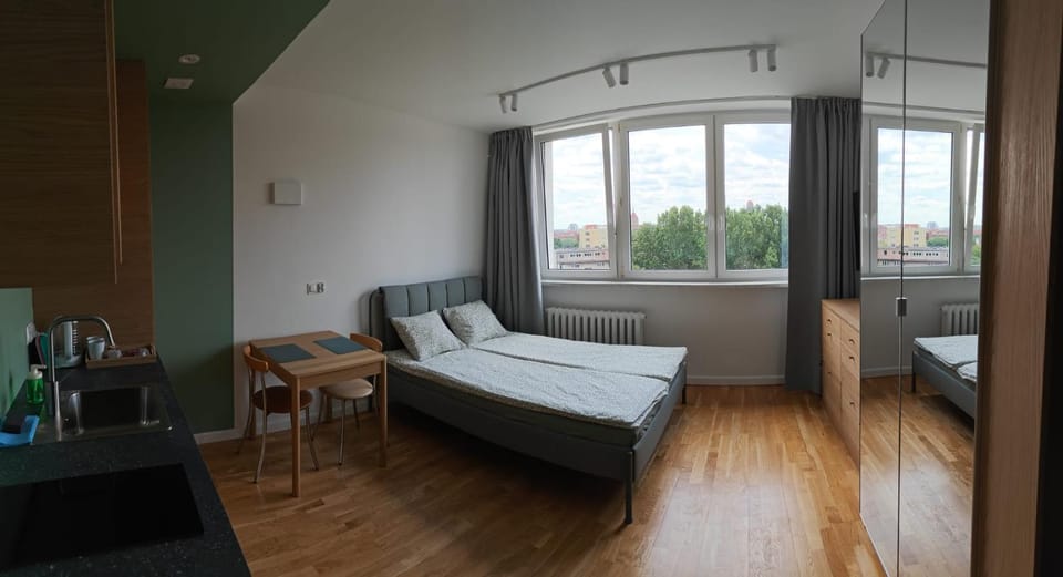 Bed, Living room, Seating area, City view