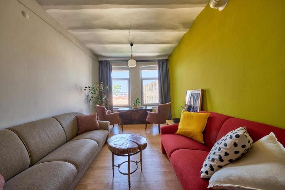 View (from property/room), Living room, Seating area, City view, Landmark view, Sea view