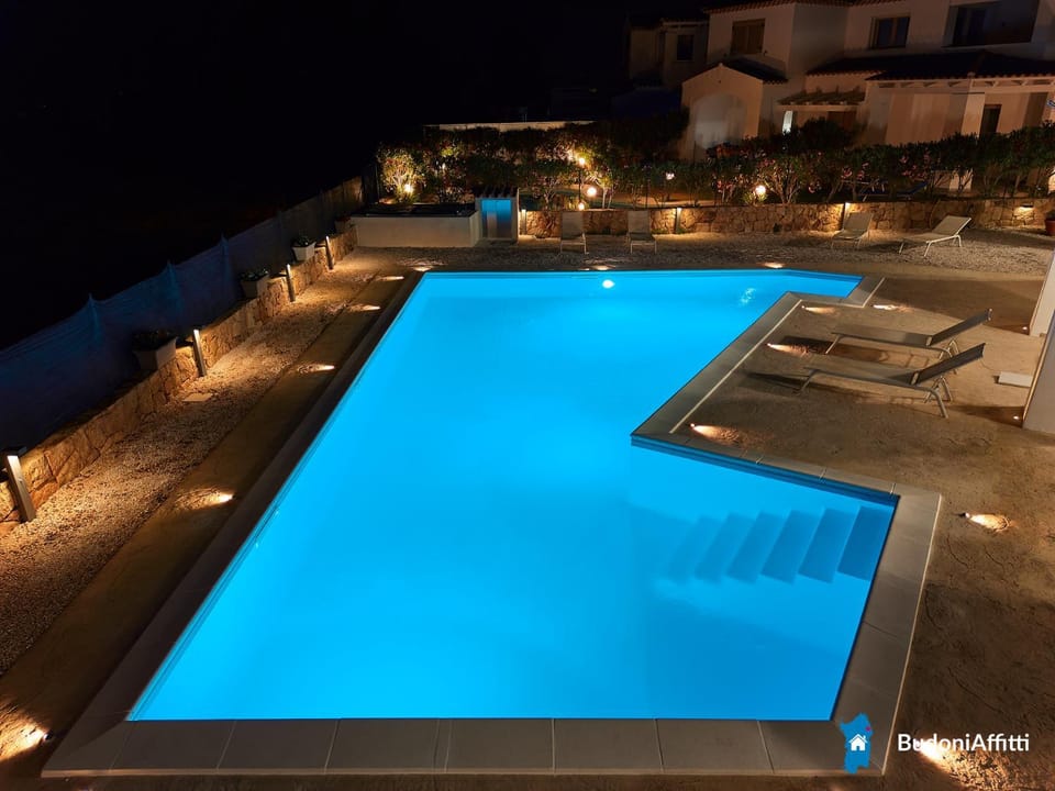 Property building, Night, Pool view, Swimming pool, sunbed