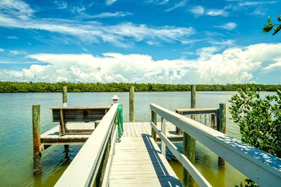 Waterfront Cottage with Pool Great for Families in Florida Docked boat in Sanibel Island