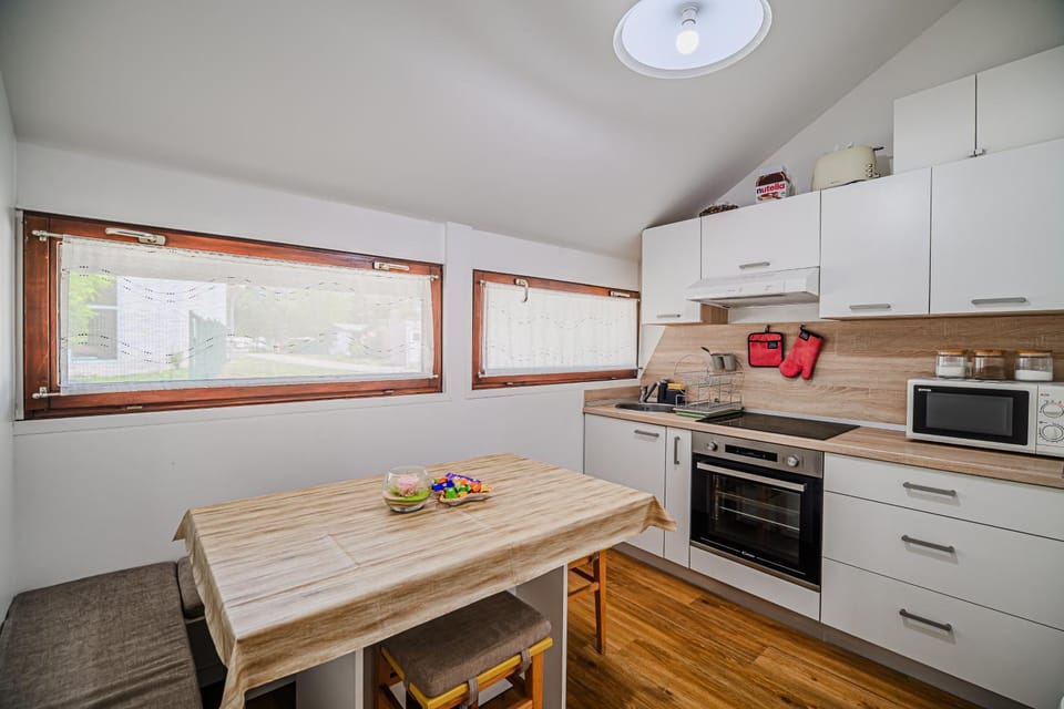 Dining area, microwave, oven, stove, kitchen