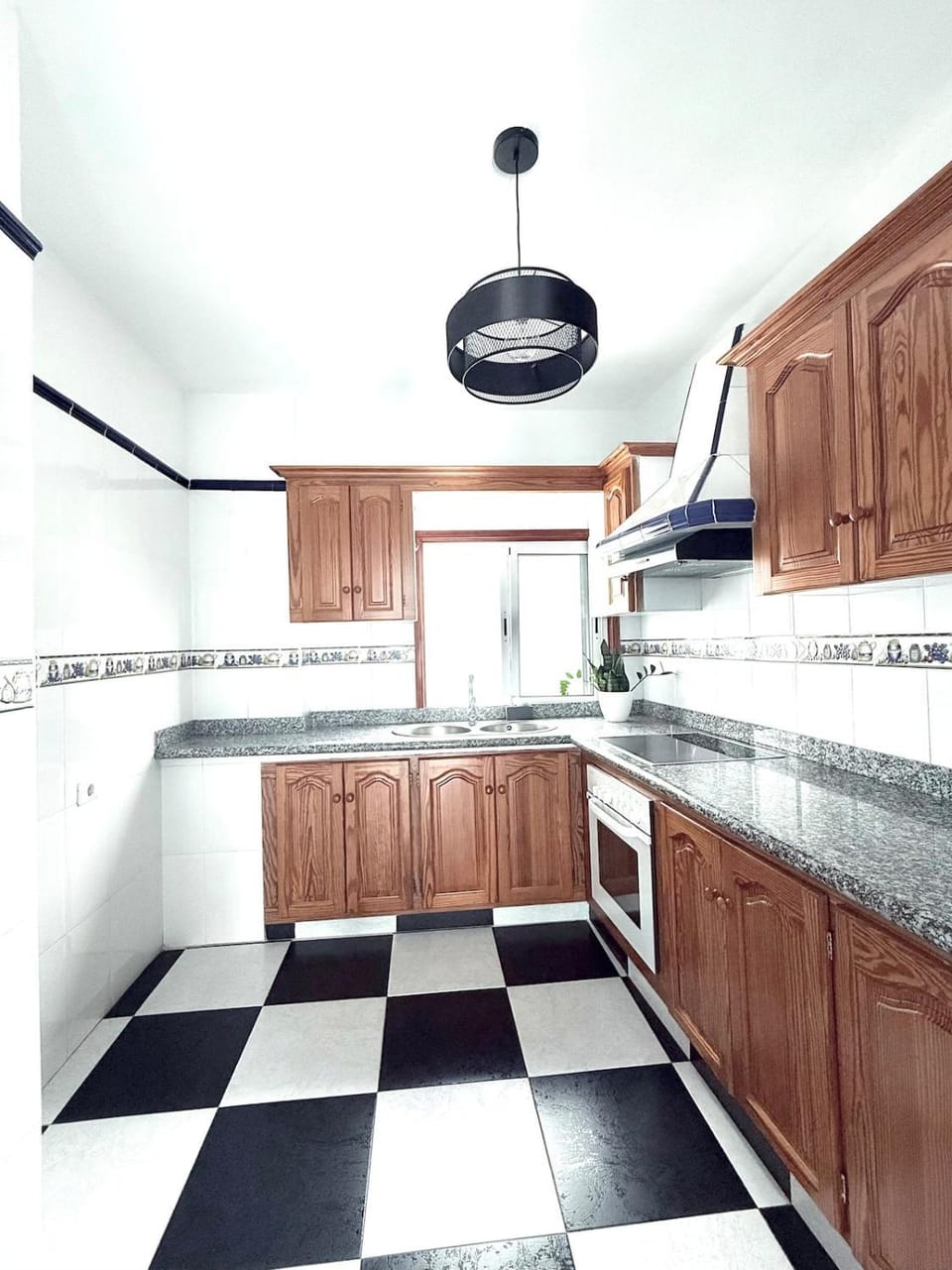 Kitchen or kitchenette, microwave, oven, stove