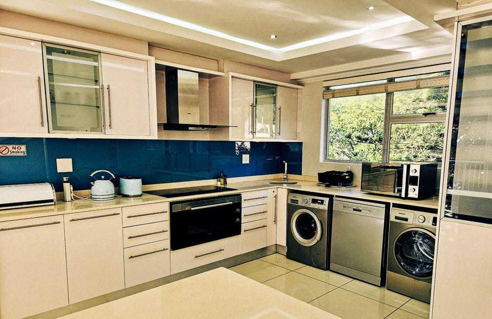dishwasher, microwave, oven, stove, toaster, washing machine, dryer, kitchen