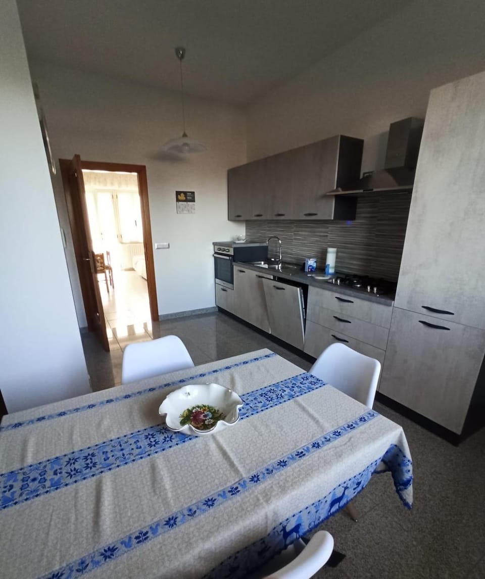 Kitchen or kitchenette, dishwasher, oven, stove