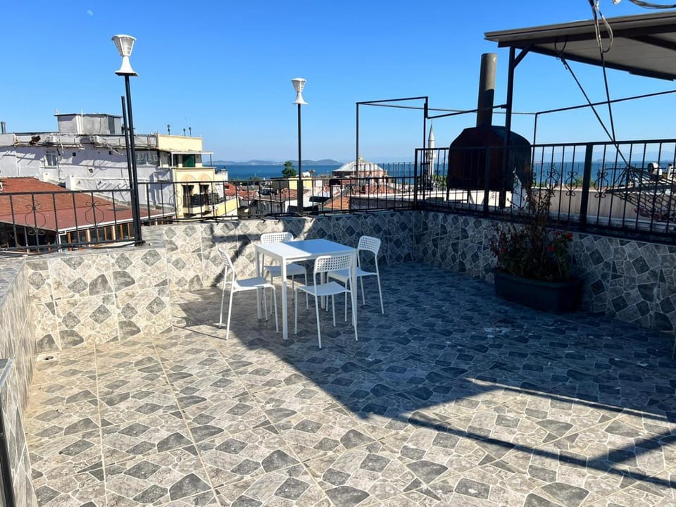 Property building, View (from property/room), Balcony/Terrace, Seating area, Sea view