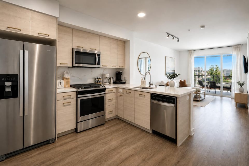 Kitchen or kitchenette, dishwasher, oven, stove, toaster