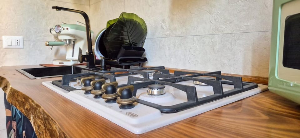 Kitchen or kitchenette, stove