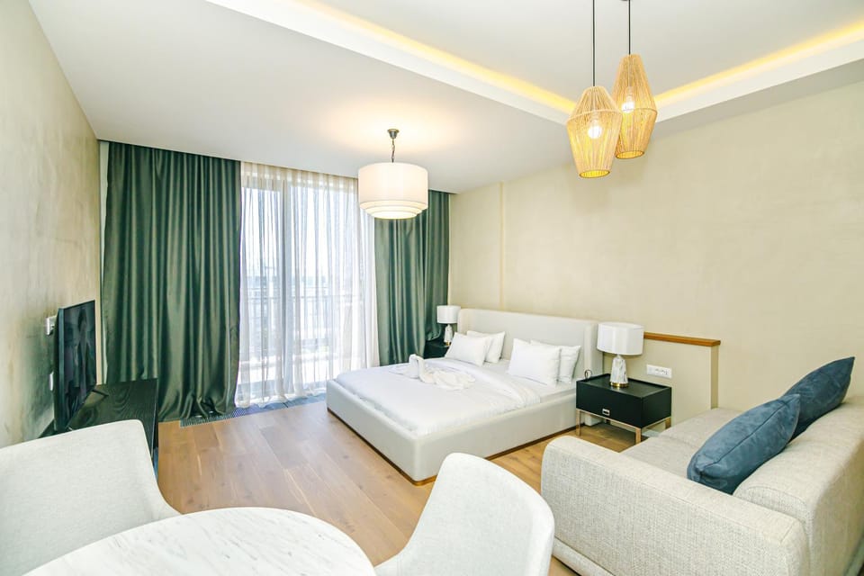Bed, Living room, Seating area, Bedroom