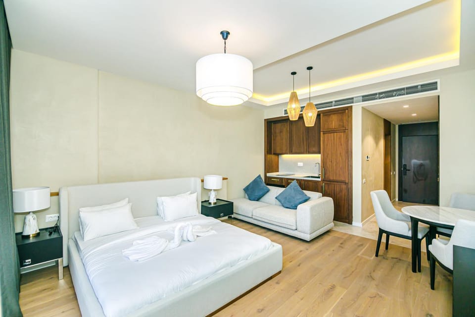 Bed, Living room, Seating area, Bedroom, towels, wardrobe