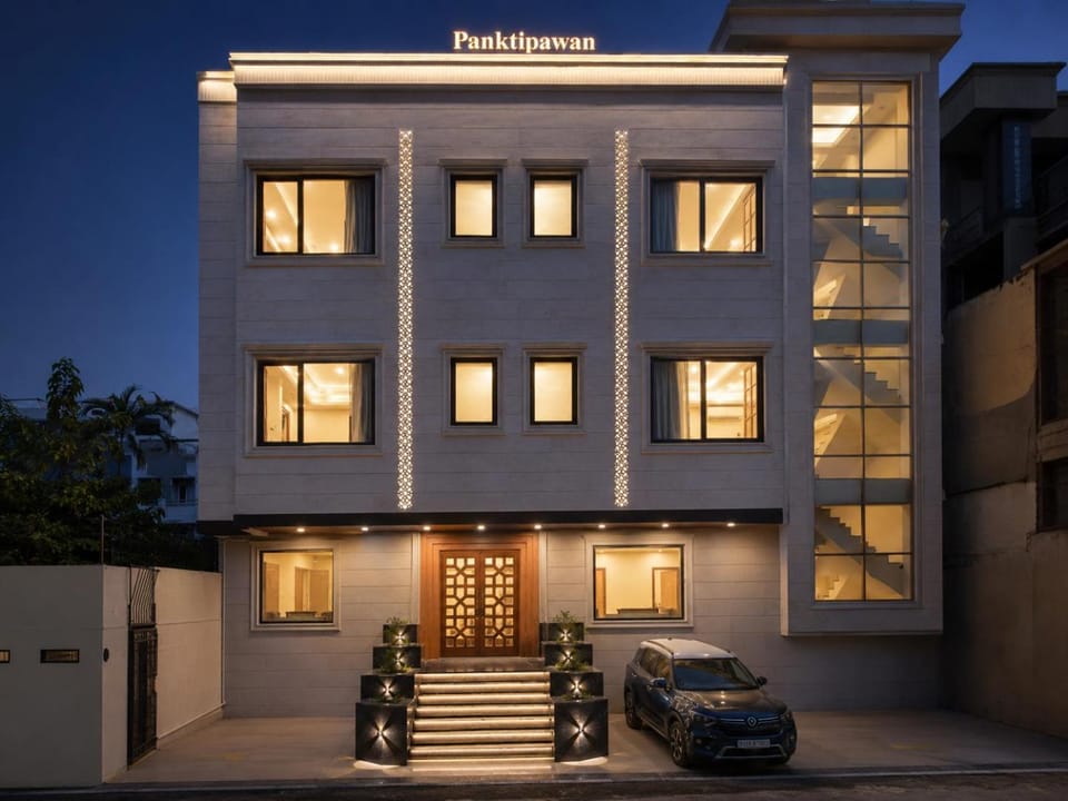 Property building, Facade/entrance, Night, Parking
