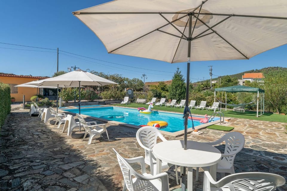 Property building, Living room, Swimming pool