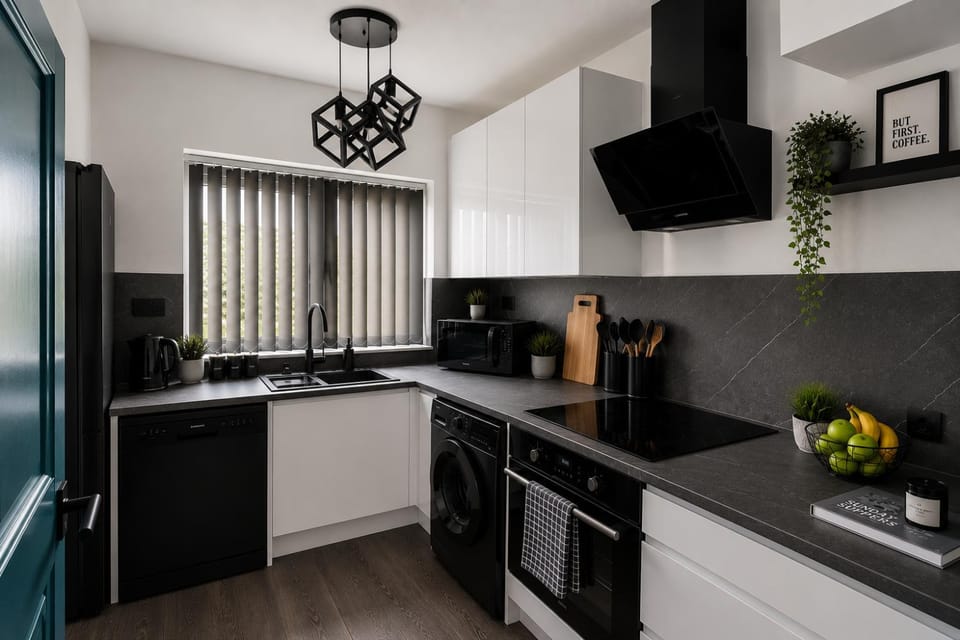 Kitchen or kitchenette, dishwasher, oven, stove