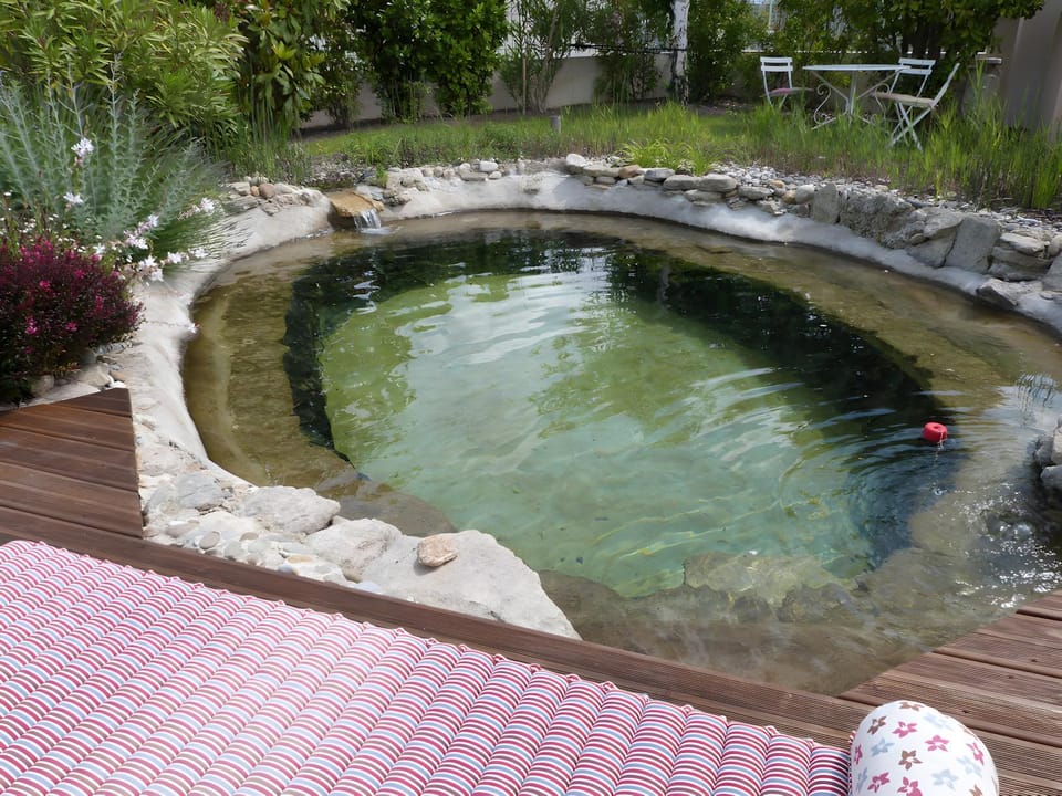 Property building, Living room, Swimming pool