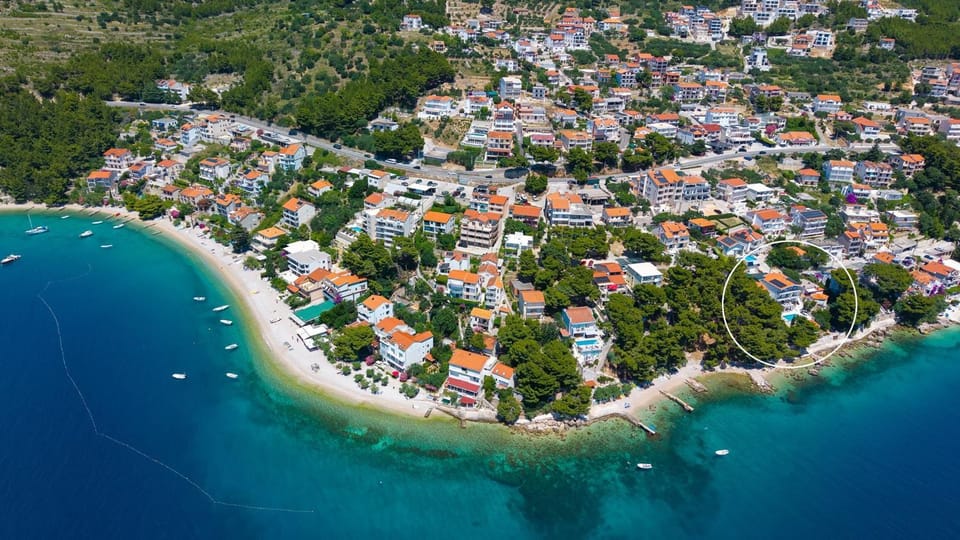 Beachfront Villa Nino, 5 bedroom villa with heated pool in Stanići Villa in Split-Dalmatia County