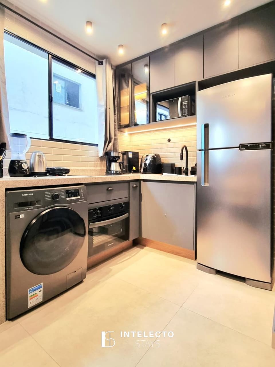 Kitchen or kitchenette, oven, stove, washing machine, dryer