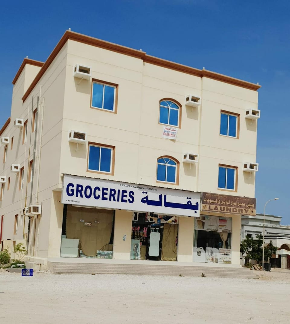 Property building, Text overlay, Street view