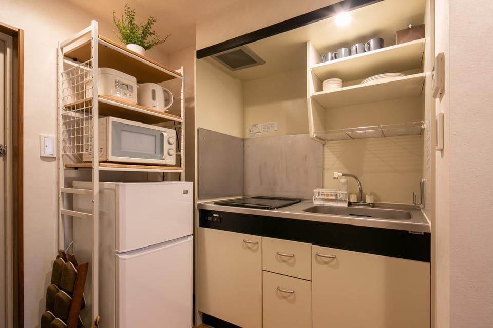 Kitchen or kitchenette, microwave
