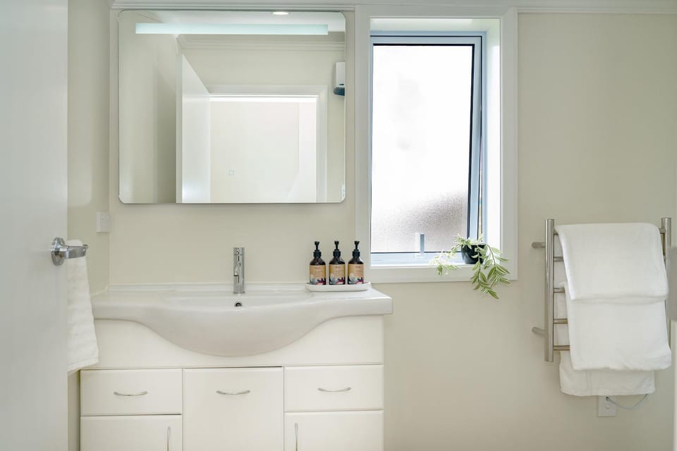 Shower, Bathroom, hair dryier, towels