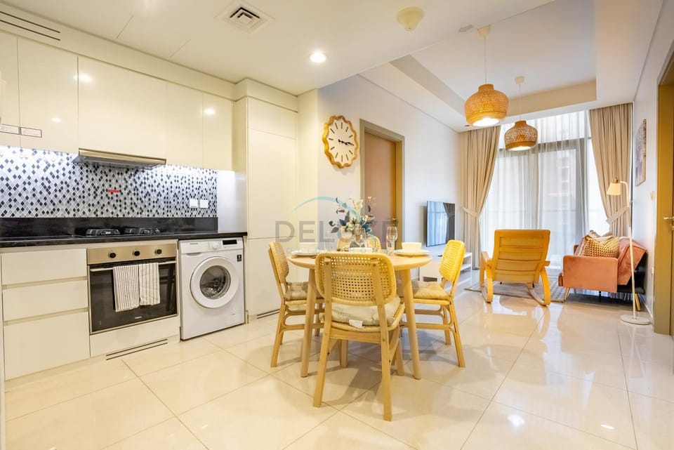 Living room, Seating area, Dining area, dishwasher, oven, stove, washing machine, kitchen